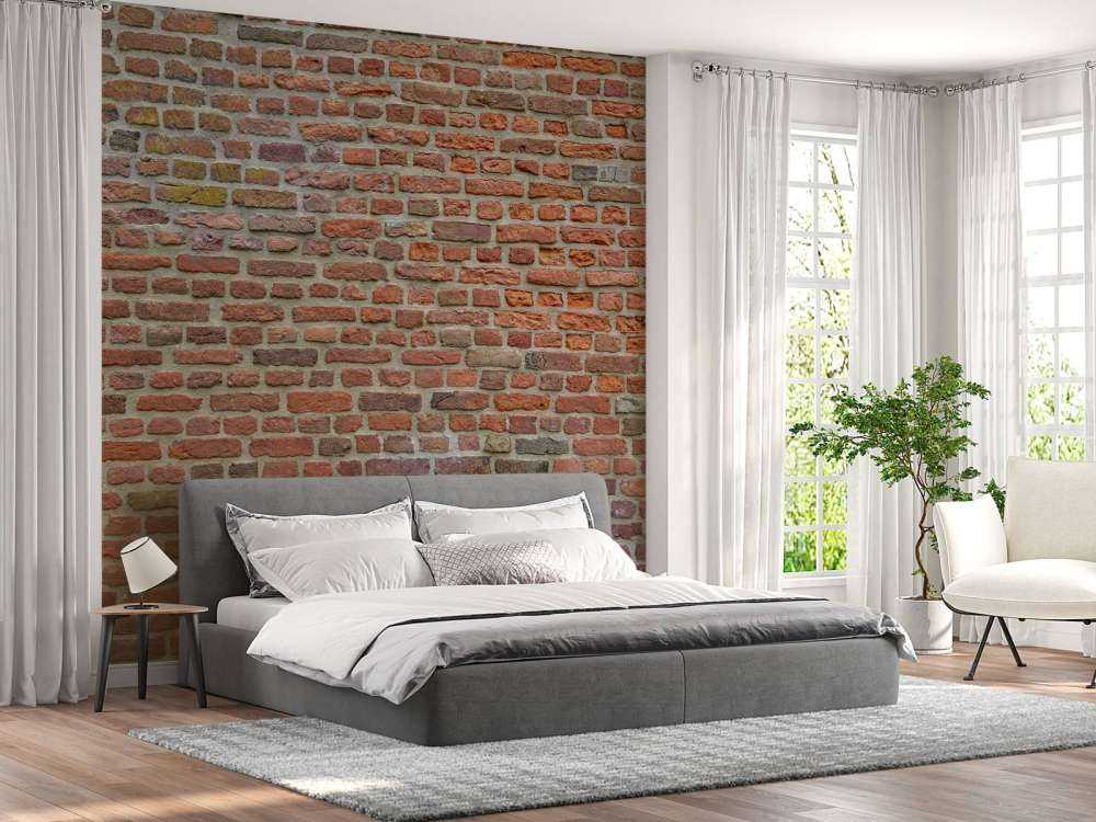 Ściana z dużymi i małymi cegłami