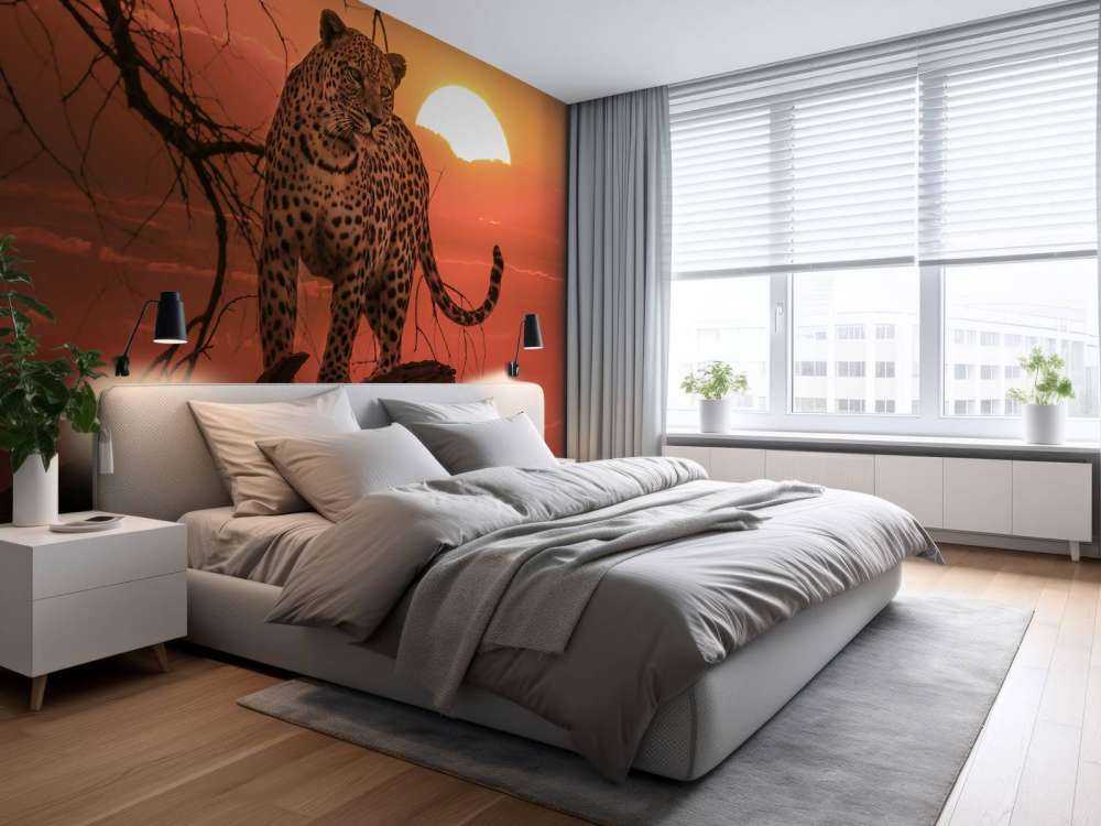 Lampart na tle zachodzącego słońca