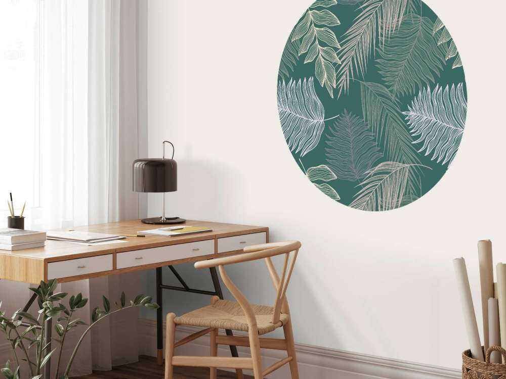 Liść palmowy na zielonym tle