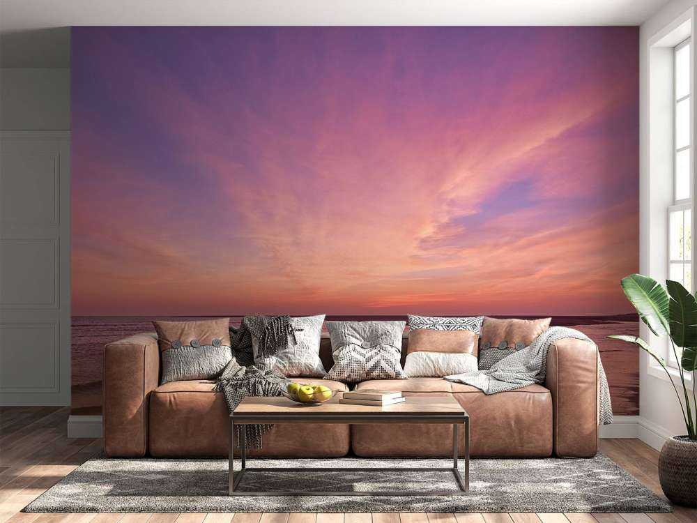 Plaża z różowym zachodem słońca