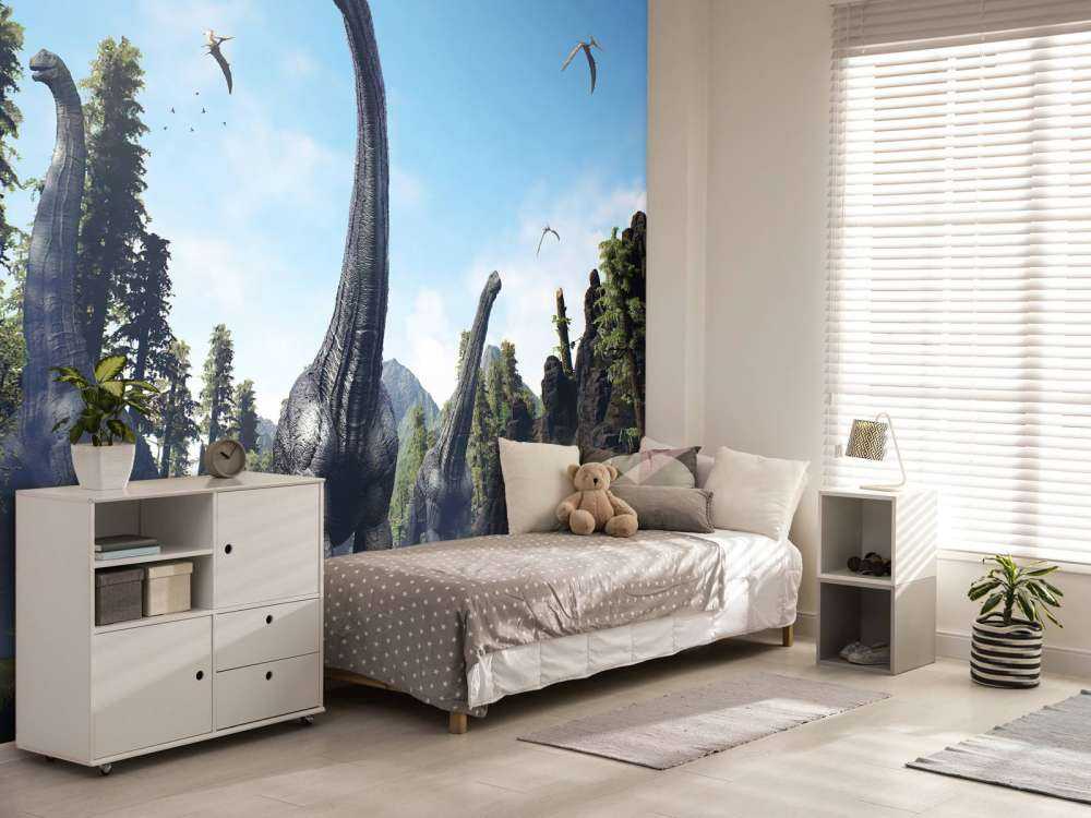 Grupa Alamosaurus idąca przez dolinę