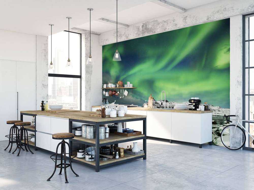 Światła północy nad zimowym krajobrazem