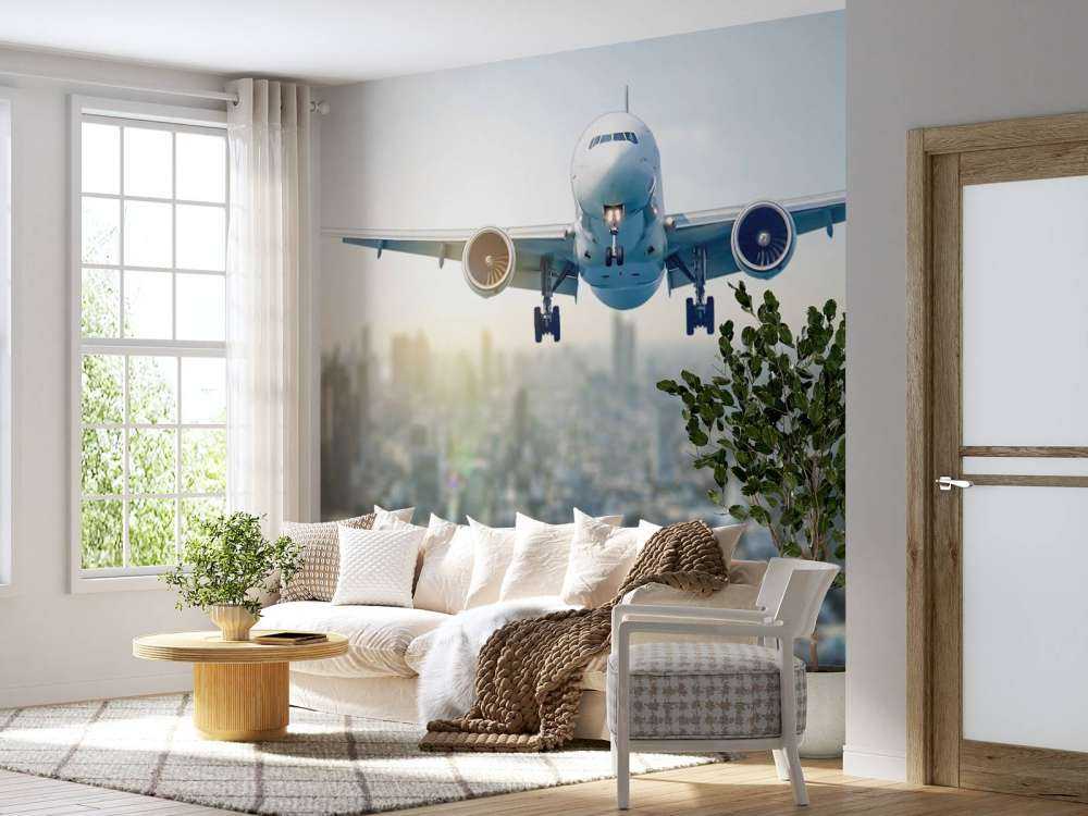 Zlatujący się samolot nad miastem