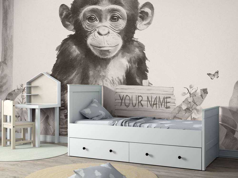 Mały szympans w beżowej dżungli