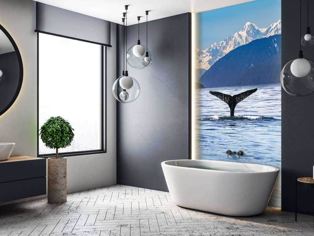 Nurkowanie wieloryba z górami w tle