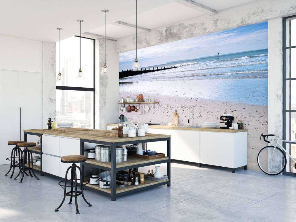 HAPPY message written in smooth sand at the beach